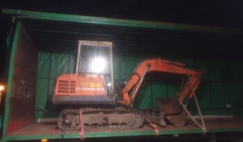 The excavator in the trailer